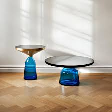 A glass coffee table makes for an elegant, subtle addition to the room, while a coffee table with storage is perfect. Classicon Bell Side Table Brass Ambientedirect