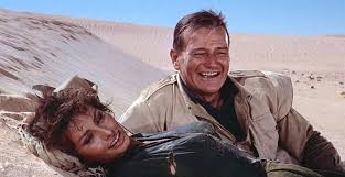 John wayne has become known as the epitome of a cowboy, but many of his first roles were as a football player in films like brown of harvard and the drop kick. 9 More Of John Wayne S Leading Ladies Mostly Westerns