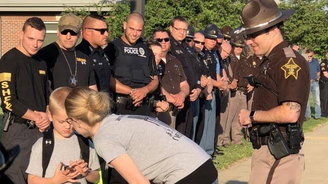 Indiana police: Son of fallen officer greeted by 70 cops at school gates |  news.com.au — Australia's leading news site for latest headlines