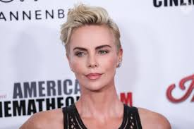 Photo : Liv Tyler, Mischa Barton, Harvey Weinstein et Georgina Chapman au  défilé Dior haute couture à Paris, en 2006.