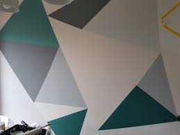 Triangle frog tape wall designs. How To Create A Colourful Triangle Mural On Your Wall Donna Ford