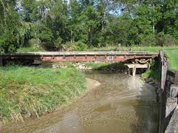 I have a creek that cuts my property in half and i would like to build a bridge to get a tractor to the back half. Building A Bridge Homestead Forum At Permies