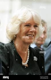 Arrives with the duchess of cornwall hi-res stock photography and images