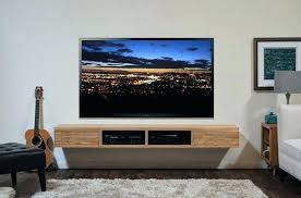 Make a tv wall cabinet that features a coastal art print! 60 Best Diy Tv Stand Ideas For Your Room Interior Bedroom Tv Wall Wall Mounted Tv Console Tv Wall Design