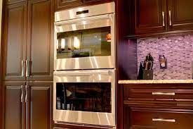 Wall cabinets are 12 to 18 inches deep and are installed above the counters and stove. Guides Wall Ovens Wall Oven Facts Home Ownership Guides
