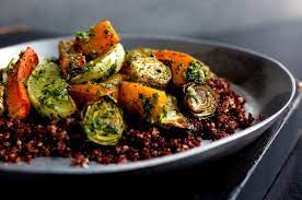 Quinoa With Roasted Winter Vegetables And Pesto Recipe Recipe Roasted Winter Vegetables Winter Vegetables Eating Well Recipes