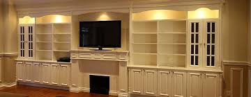 An entertainment center leave house your television set vcr stereo system and play here's how to build your possess custom unit exploitation hackneyed cabinets. Build In Wall Tv Entertainment Units Custom Bookcases Tv Great Room Bookshelves