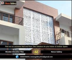 Wooden Elevation Tiles Find Out Our Exclusive Wall And Floor Tiles Solutions For Your Indoor Outdoor Spa Wooden Tile Wall And Floor Tiles Modern House Design