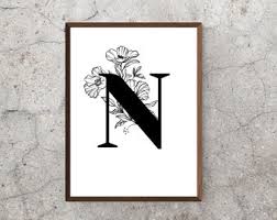 This photo is 2 kayak . Black Letter N Etsy