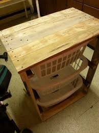 Use a scrap piece of wood to create the perfect holder for a catch all in the laundry room. Pallet Laundry Basket Holder