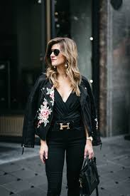 All Black Bodysuit Outfit With Embroidered Leather Jacket Black Jeans Statement Belt And He Jacket Outfit Women Embroidered Leather Jacket Body Suit Outfits