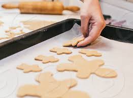 Cookies christmas cookie advent gingerbread hot chocolate christmas baking food sweet. Baking Christmas Cookies Woman S Hand Cutting Cookie Dough Kitchen Counter Lifestyle At Home By Marko Klaric Photo Stock Snapwire