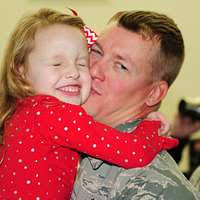 The Codding family poses with Indy, Hunter's soon-to-be