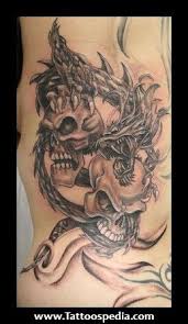 In a sense, a dragon skull tattoo symbolizes that the wearer has conquered a past difficulty, whether it's the death of a loved one or a destructive habit, like addiction. Dragon And Skull Tattoos Tattoospedia Dragon Tattoo With Skull Dragon Tattoo Designs Dragon Tattoo