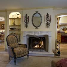 A repainted mora clock is a gorgeous find. French Country Fireplace Houzz
