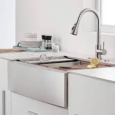 One side of the sink (typically the side facing the kitchen) is flattened and the opposite side (where the faucet sits) is rounded. 33 Inch Farmhouse Kitchen Sink Celaeno Single Bowl Stainless Steel Workstation Kitchen Sink 18 Gauge Deep Handmade R10 Kitchenfaucets Com