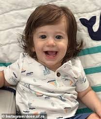 Mom says her 11-month-old son's hair is so long people accuse her of  putting the baby in wigs