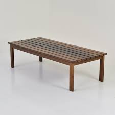 A coffee table bench is a furniture piece usually made of wood that is designed for setting food and other items on as well as to use for extra seating. Slat Bench Or Coffee Table In Wenge Ash 1960 S 158125