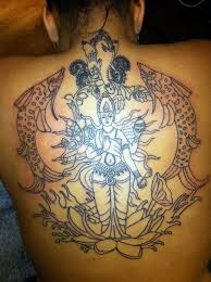The shading and color contrast speak to that original tattoo genre while still including the religious symbols of the cross and the crown of thorns. 1001 Ideas For Spiritual Tattoos To Unlock Your Chakras