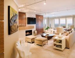 She took the wall space between the two windows and above her sofa and used that as the blank canvas. 30 Modern Living Rooms With Fireplace And Tv Together Decor Snob