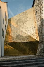 Mldz S Deconstructed Gold Pegboard Is Actually A Museum Architecture Architecture Exterior Architecture Design
