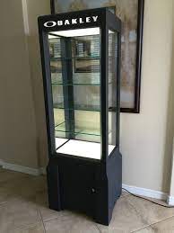 Oakley Sungalsses Retail Display Case Four Glass Shelves With Lighting Retail Shelves Display Glass Wall Shelves Glass Shelves