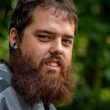 What type of auger is suitable for use with a tractor?