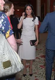 Prince harry says that his wife meghan markle cried in her pillow after reports indicated that buckingham palace was launching a probe into the bullying allegations that were made against her. Meghan Markle S Prada Dress At Queen S Leaders Awards Criticized Another Failed Attempt