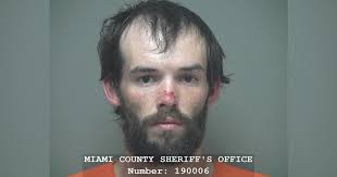 Driver crashes into pond after police pursuit