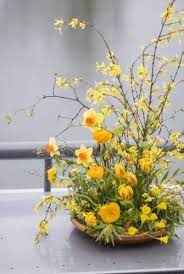 Amazing Organic Wild Garden Arrangement In Yellow Tulips Arrangement Spring Flower Arrangements Centerpieces Spring Flower Arrangements