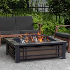 One of the best ways to spend a chilly evening is relaxing in front of a glowing fire, soaking up the warmth, and letting your mind unwind after dealing with the stresses of day to day life. Real Flame Hamilton 43 Inch Rectangle Wood Burning Fire Pit Black 946 Nst Bbqguys