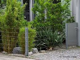 Leichter Gartenzaun Mit Spanndraht Moderne Gartenentwurfe Krautergarten Design Vorgarten Zaun