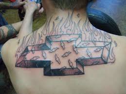 Color realistic truck tattoo by richard hart tattoonow. Chevrolet Logo In Flames Tattoo On Back Tattooimages Biz