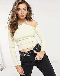 Order now with multiple payment and delivery options, including free and unlimited next day delivery (ts&cs apply). Bershka Strappy Bardot Knit Top In Buttermilk Asos
