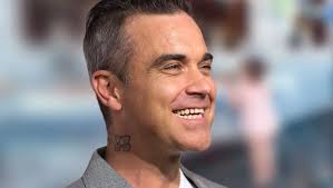 Enter & enjoy it now! Robbie Williams Ayda Als Er Sein T Shirt Auszog Dachte Ich Nur Was Fur Ein Bad Boy Bunte De