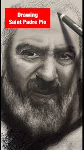 Drawing a large drawing of Saint Padre Pio, charcoal