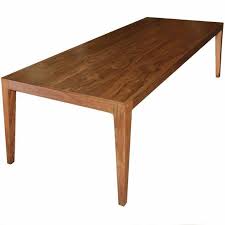 The chairs that sit behind the table can give your meal an extra special touch and a way of relaxation that you might not otherwise get. Petersen Antiques Parsons Table In Solid Bookmatched Walnut