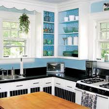 Sometimes, a wall of kitchen cabinets needs to be broken up. A Cheerful Kitchen Makeover For 935 This Old House