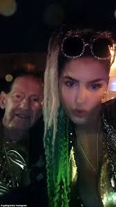 Geoffrey Edelsten wears matching gold ensembles with wife Gabi Grecko