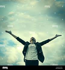 Woman pulls hands sky freedom hi-res stock photography and images - Alamy