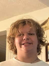 This kid, with his big smile and even bigger forehead (to my defense, a  month earlier I had opened a car door while in motion and fell out,  injuring my head, and