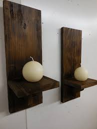 They break up the monotony of a plain white wall in a way that's unique and at the same time artistic. This Item Is Unavailable Etsy Wooden Sconces Wall Candles Wall Candle Holders