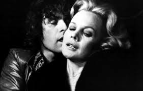 Carroll with co-star Paul Nicholas in THE WORLD IS FULL OF MARRIED MEN  (1979).