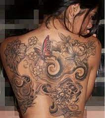 Flying Butterflies And Flower Curves Tattoo On Back Tattoos Picture Tattoos Cool Tattoos