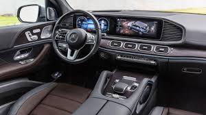 The Interior Of The 2019 Mercedes Benz Gle 450 4matic With Rough Leather In Espresso Brown Magma Grey And Mercedes Benz Gle Mercedes Gle Suv Mercedes Benz Suv