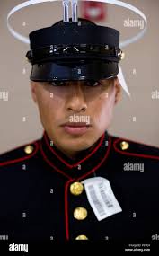 U.S. Marine Corps recruit Christian O. Burgos with Company B, 1st Recruit  Training Battalion, Recruit Training Regiment, waits in line aboard Marine  Corps Recruit Depot San Diego, Calif., May 17, 2016. Burgos