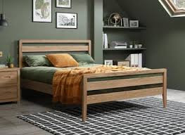 Composed of solid acacia wood, this one has a low profile platform. Wooden Bed Frames Free Delivery Dreams