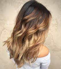 Caramel Balayage Is Trending And For Good Reason The Sought After Shade Is Universally Flatt Balayage Hair Caramel Brunette Balayage Hair Balayage Hair Blonde