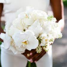 Wedding bouquets with orchids and other blooms. 20 All White Wedding Flower Ideas