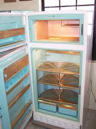 It makes us feel like a kid again. Vintage Appliances General Electric With Lazy Susan Vintage Refrigerator Vintage Kitchen Table Vintage Appliances